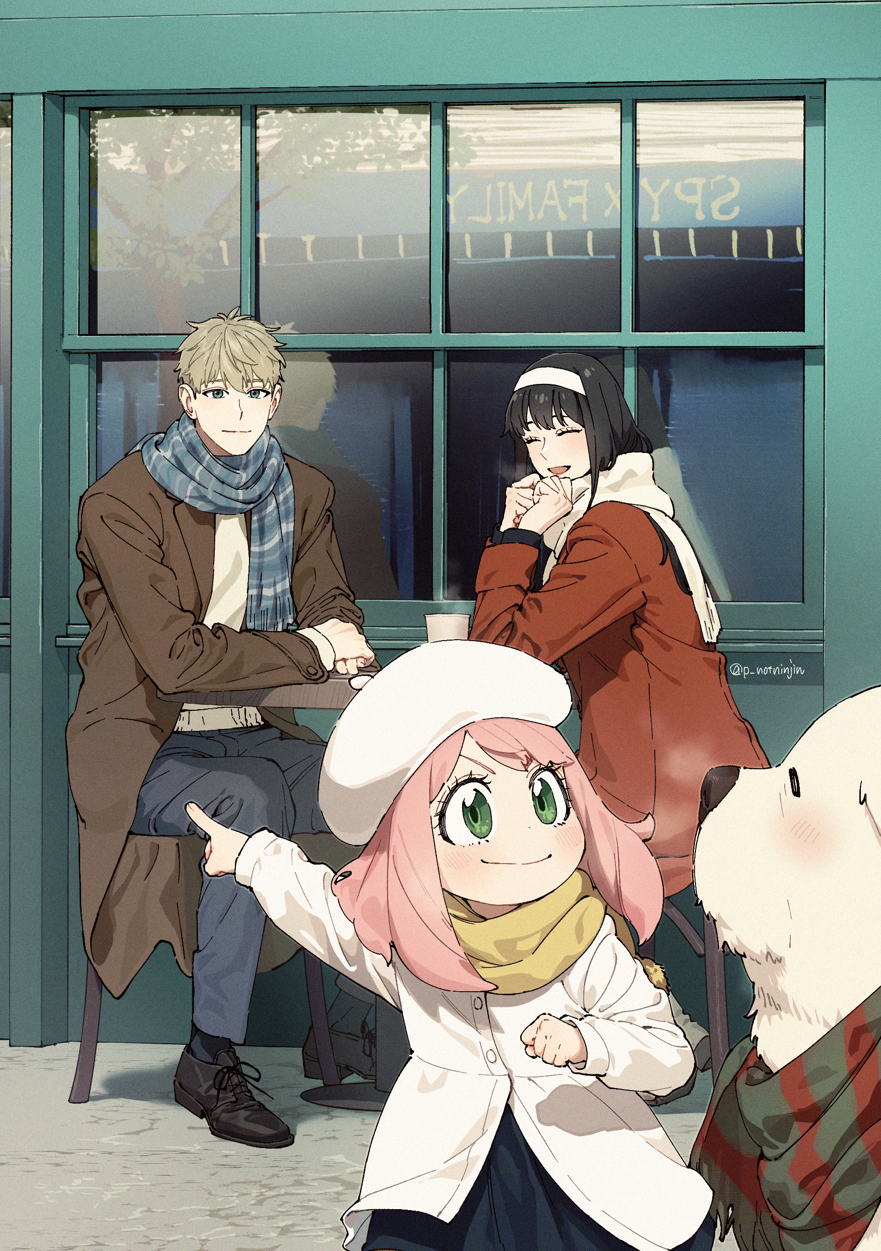 Foto da família Forger tomando café.